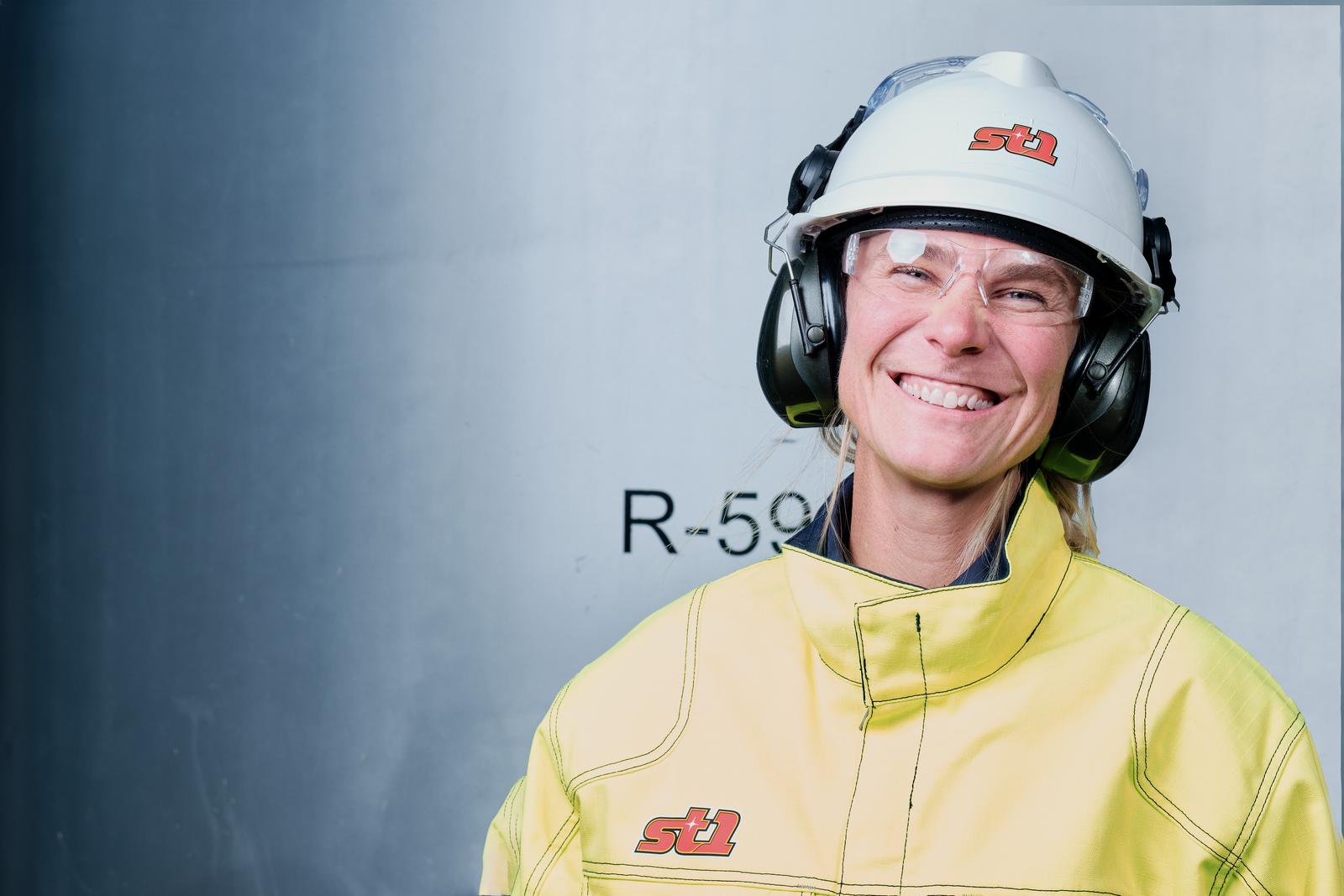 Woman in safety helmet smiling
